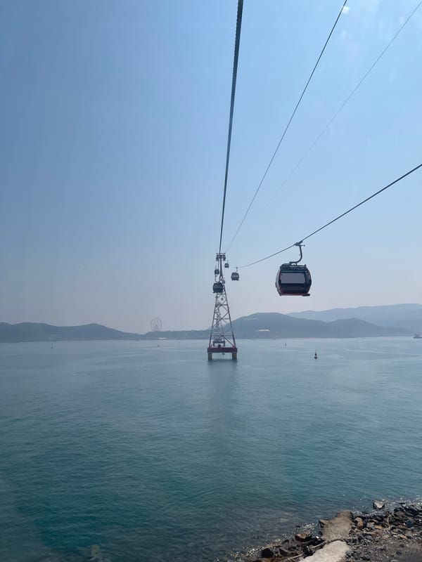 Woman takes mirror selfie in Nha Trang, Vietnam