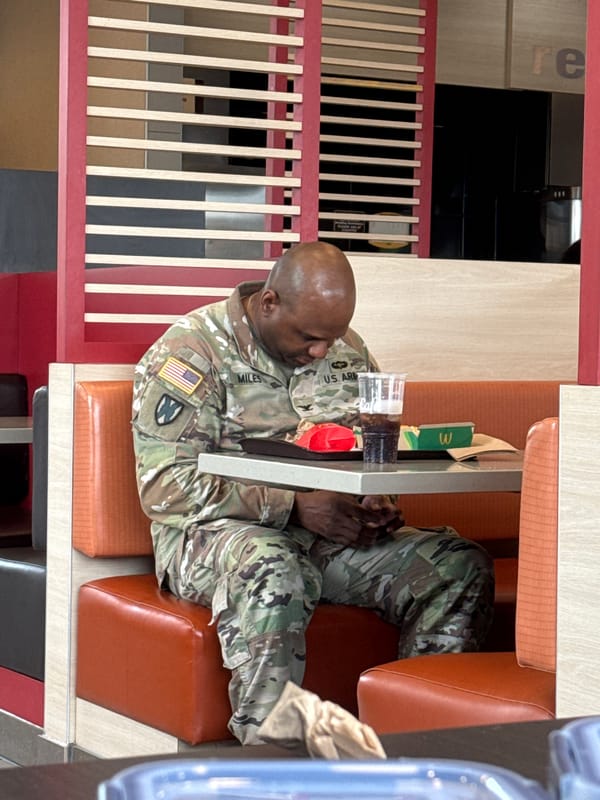 Army soldier rests at McDonald's in Woodlawn