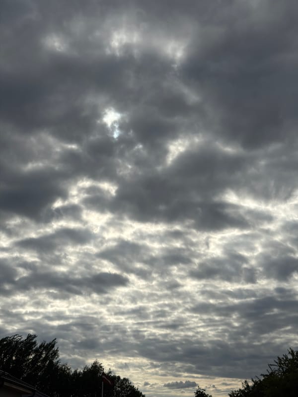 Shopper observes dramatic clouds from car in Dreiliņi, Latvia