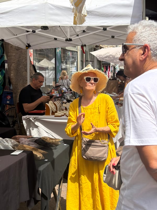 Art market documented in Tel-Aviv featuring sculptures and crafts