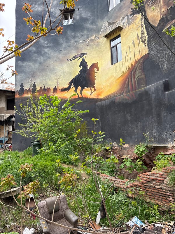 Tbilisi street art and clock tower captured by witnesses