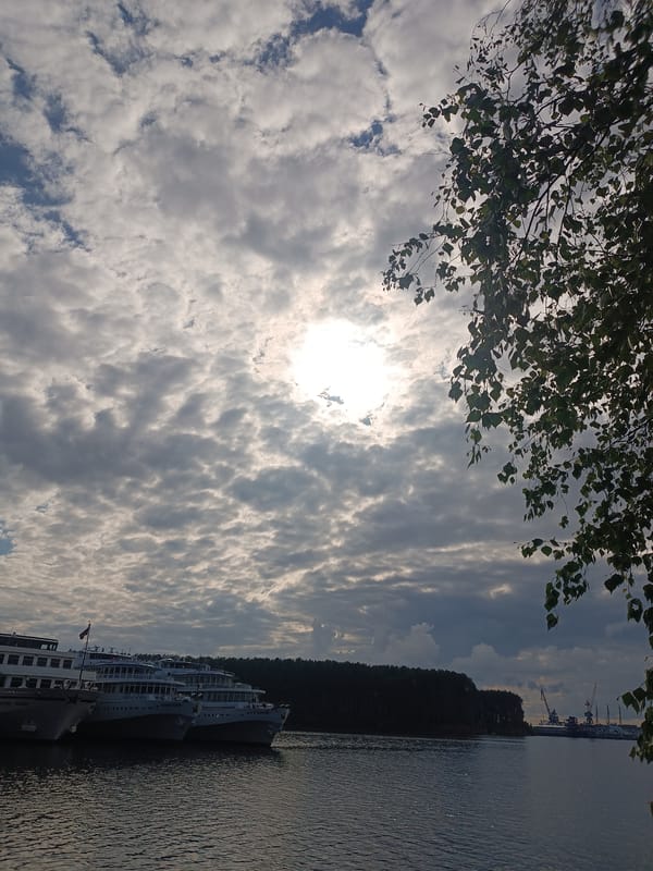 Tourist documents leisurely afternoon exploring Chaikovsky, Russia riverside and forests