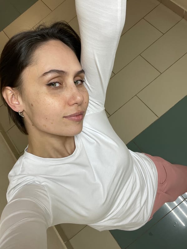 Woman photographed in two indoor locations in Izhevsk