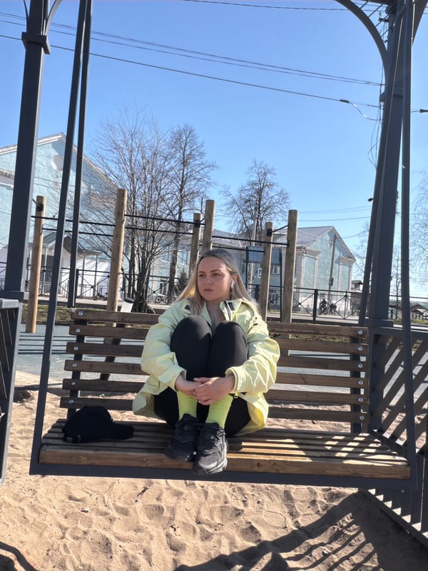 Woman with stroller enjoys lakeside break in Votkinsk