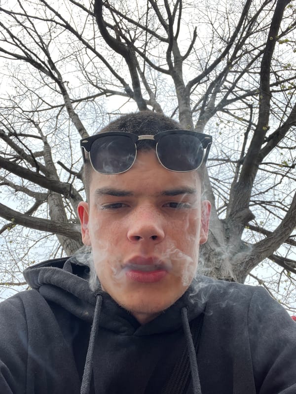 Young man films selfies, social media content in Sopot