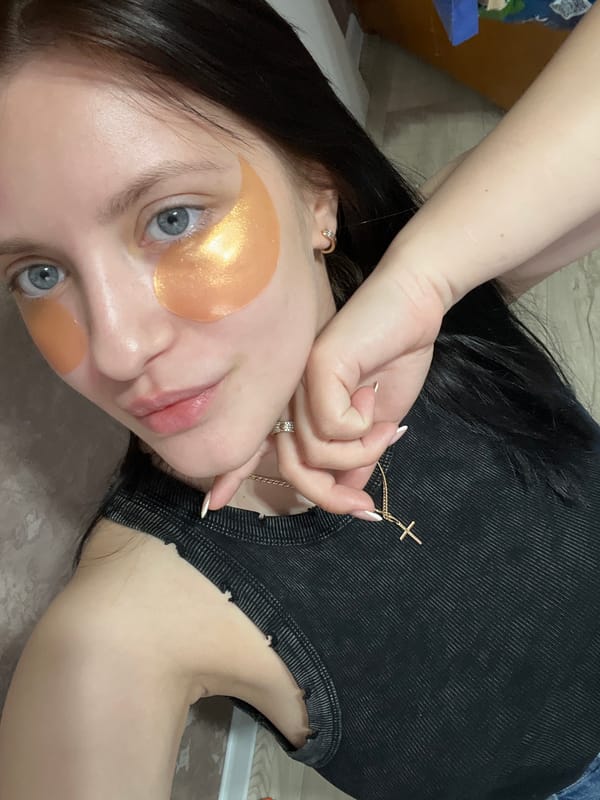 Woman with gold eye patches observed resting in Марковский