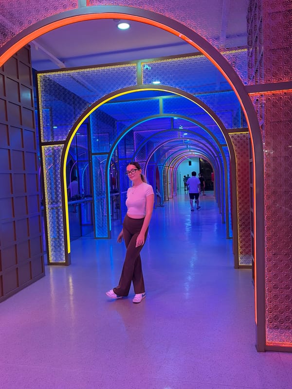 Neon interiors and flag-lined streets on a Hanoi holiday night