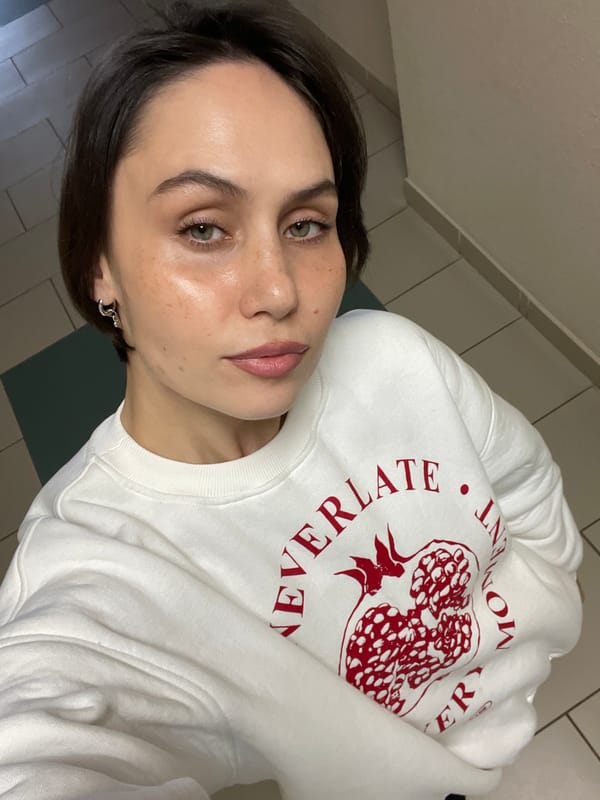 Woman takes morning mirror selfies in Izhevsk apartment