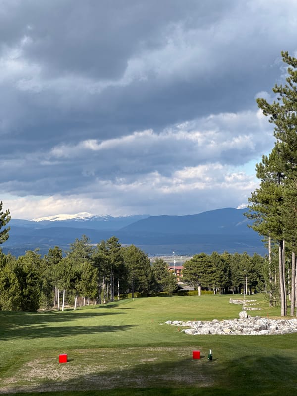 Golfers practice at driving range in Razlog, Bulgaria