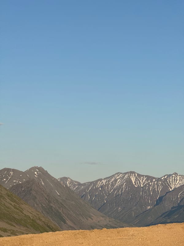 Russian location scenes spanning construction sites to mountain views