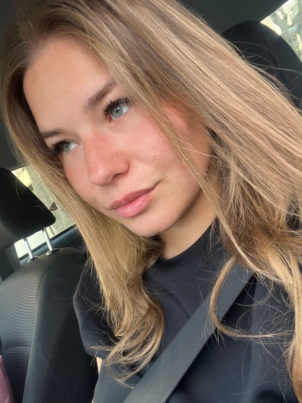 Woman seated in car observed in Budva, Montenegro