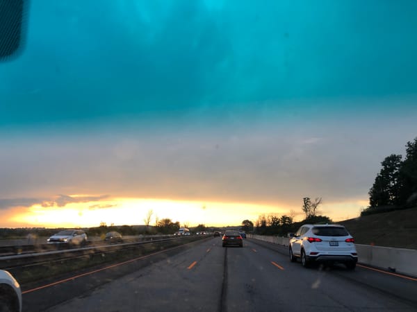 Sunset sky over an Ontario highway drive