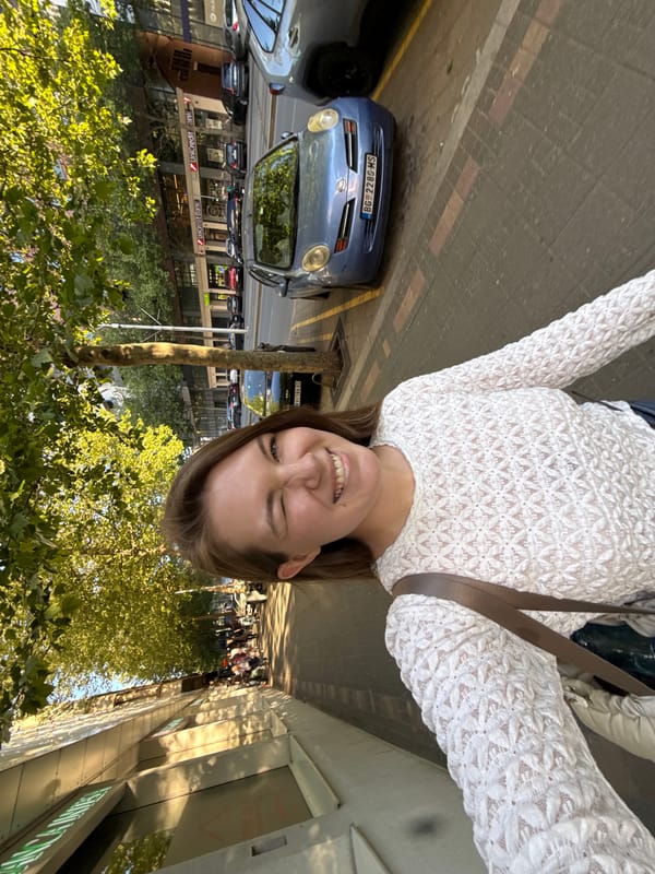Woman takes upside-down selfie on Belgrade street