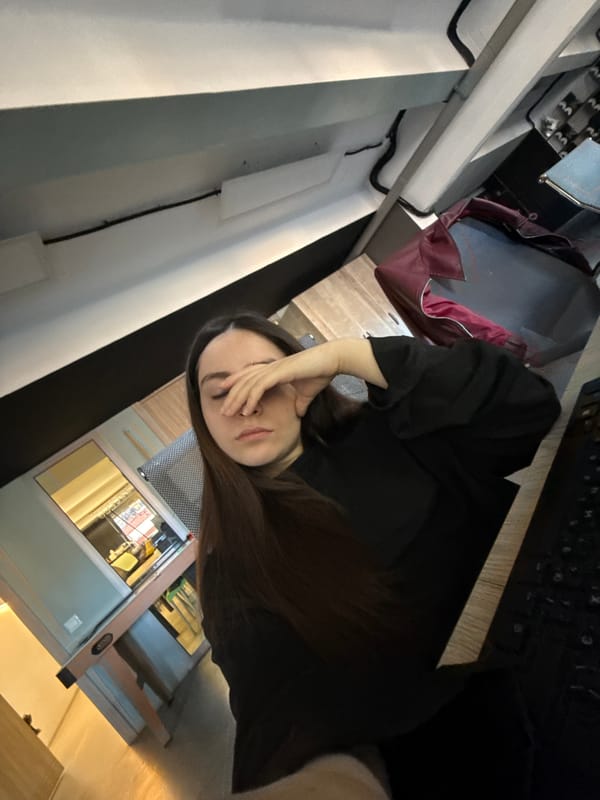 Woman at desk workspace in Yerevan viewing marketing content