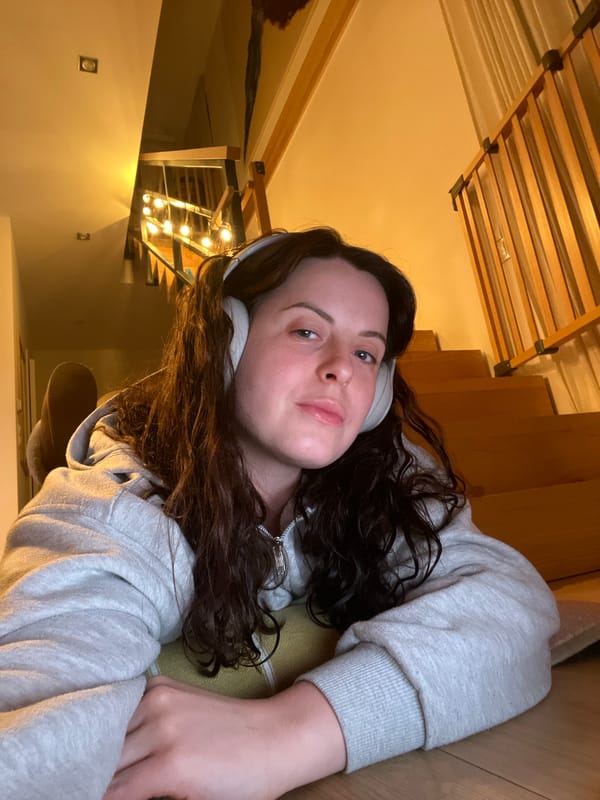 Woman in headphones observed resting in Gangloff, Germany