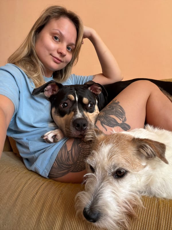Woman with dogs photographed in Tel Aviv indoor settings