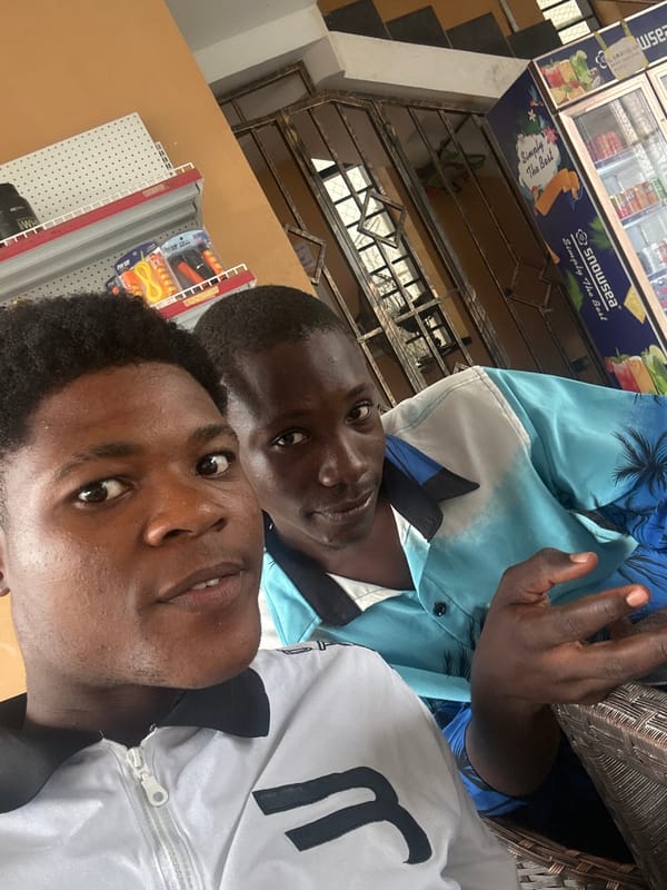 Young men enjoy pool games and social time in Ihiagwa