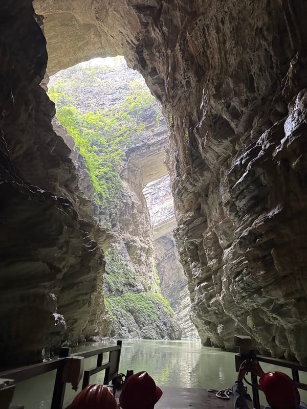 Underground cavern photographed with sunlight streaming through opening