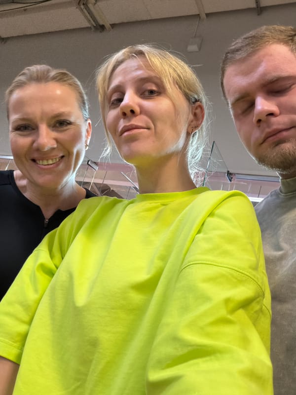 Three people pose for selfie in Chaikovsky, Russia