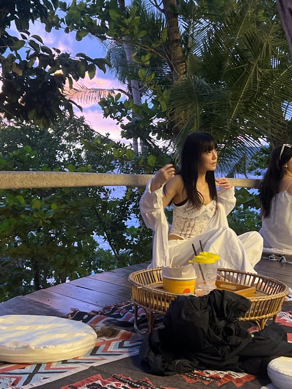 Sunset session at a rocky Karon Beach deck venue