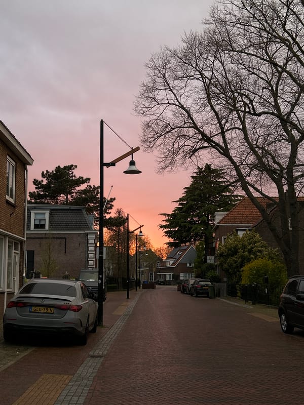 Mercedes parked on Sliedrecht street during colorful dusk