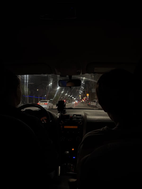 Evening drive through Izhevsk streets captured from vehicle interior