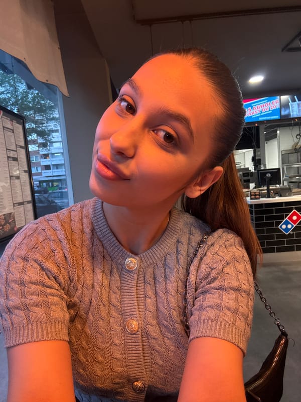 Woman takes selfies at Domino's Pizza in Mönchengladbach