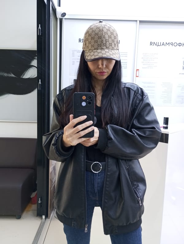 Women photographed taking selfies across Izhevsk, Russia locations