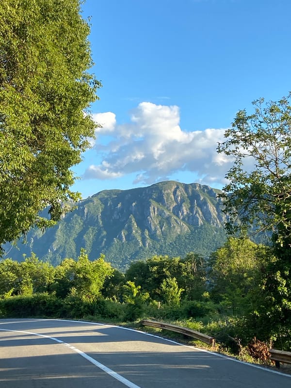 Rural Montenegro scenes captured along roadway near historic restaurant