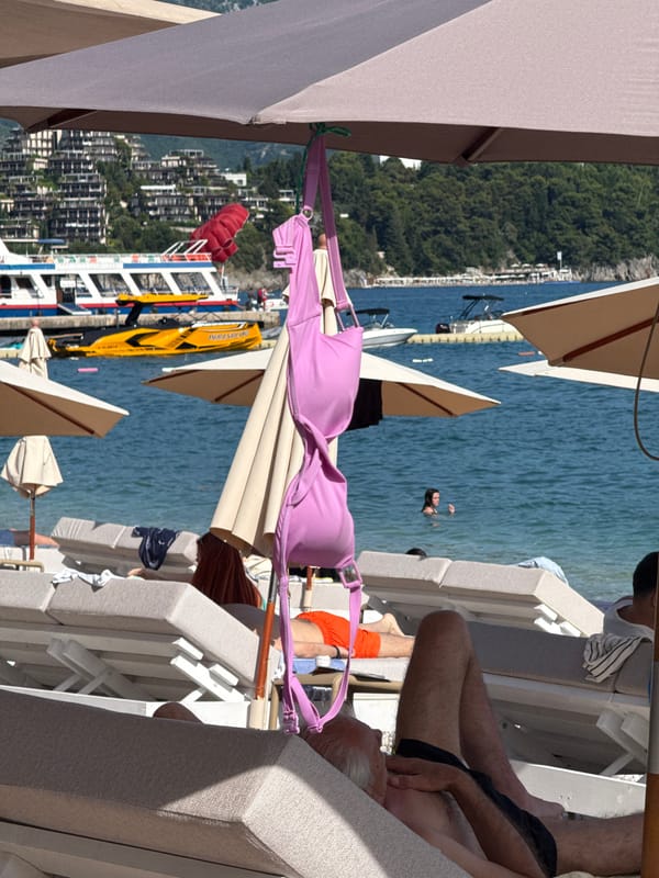 Sunny afternoon beach activities captured across Budva, Montenegro