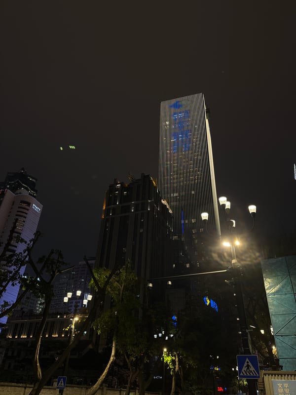 Nighttime urban architecture photographed in Yuzhong District, China