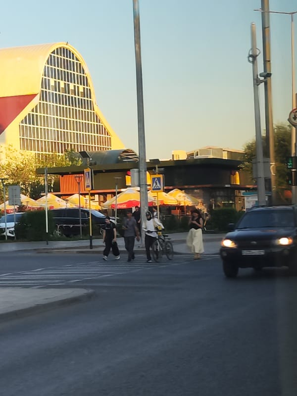Street-level look at a mixed-use neighborhood in central Astana