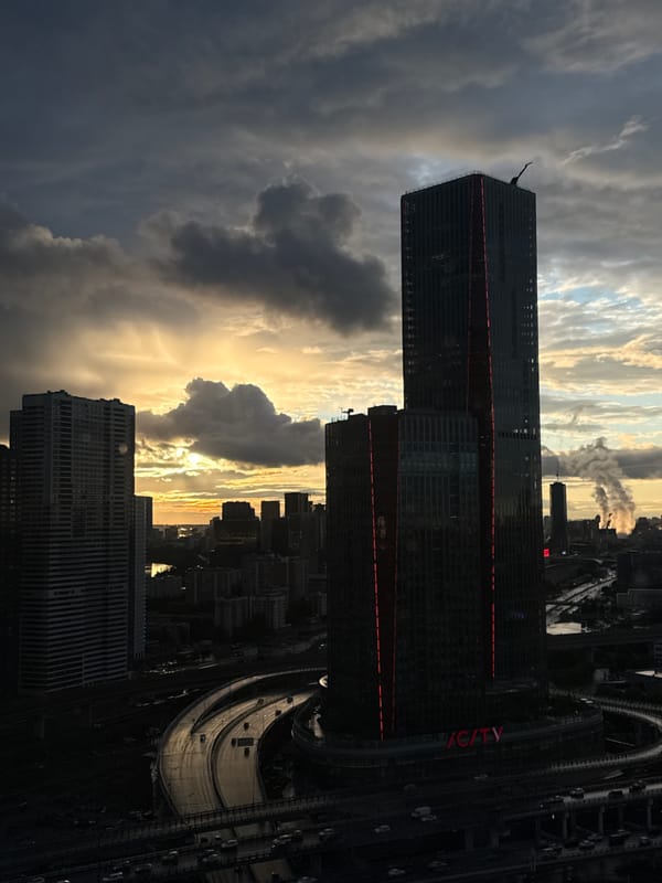 Khimki cityscape photographed at dusk with illuminated skyscraper