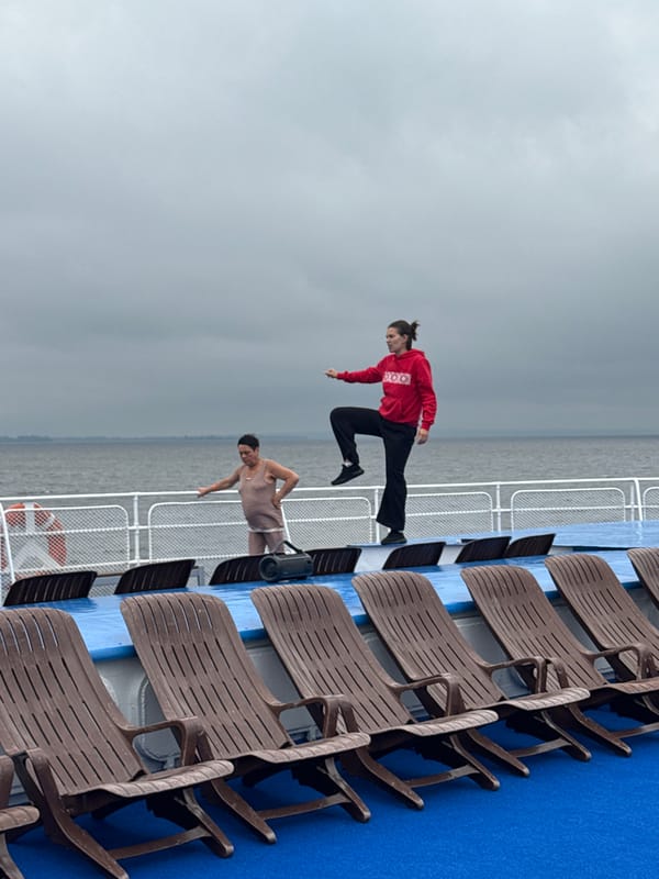 Ferry deck life on a cloudy Russian waterway