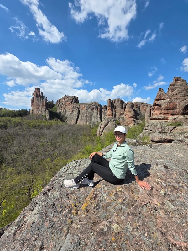 Tourists with dog visit famous Belogradchik Rocks in Bulgaria