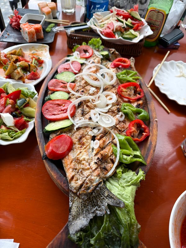 Food, rides, and boats along Issyk-Kul's Bosteri shore