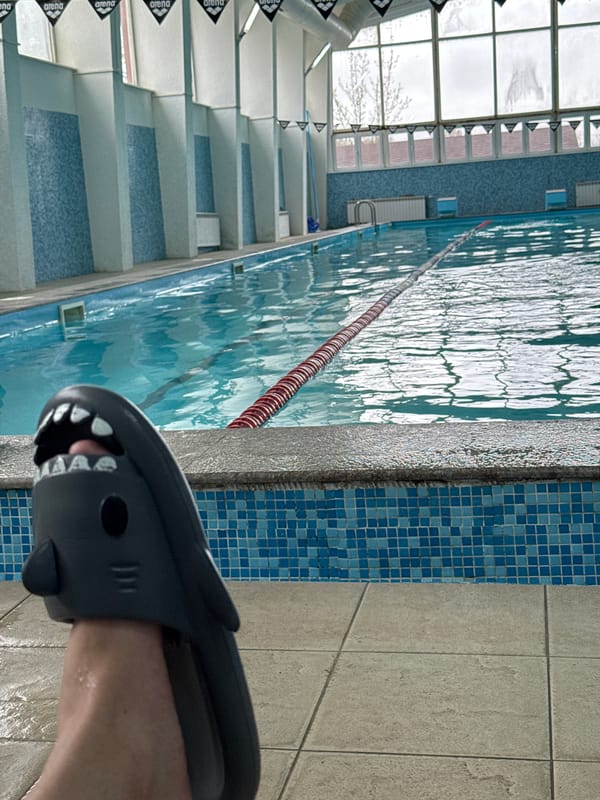 Pool workout session with shark sandals documented in Plovdiv