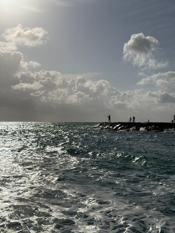 Cloudy skies and ocean views captured at Bal Harbour breakwater
