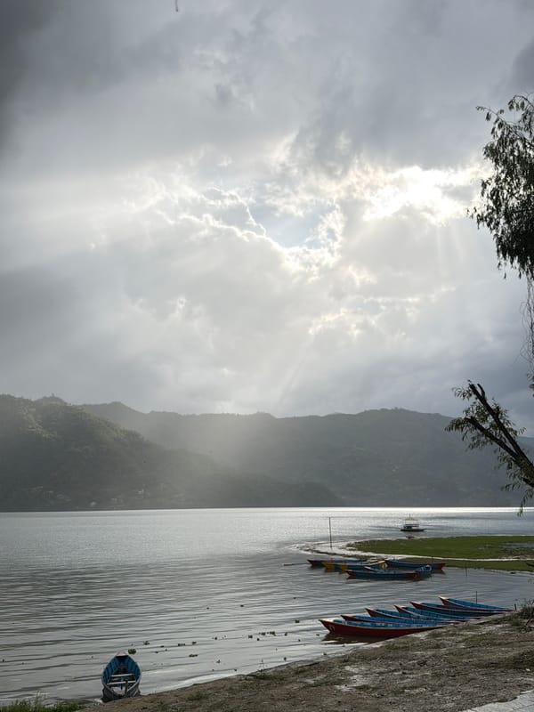 Misty mountain landscape and water captured in Pokhara