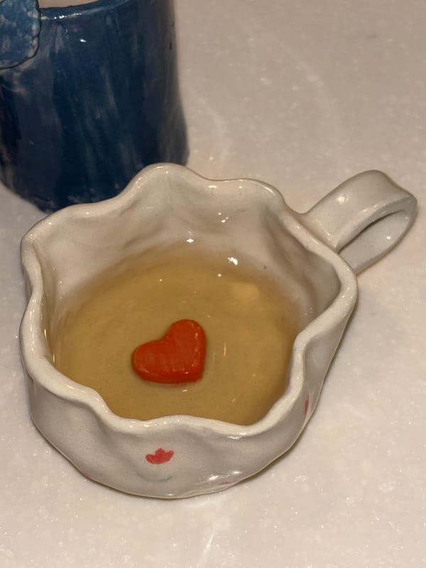 Decorative ceramic mugs documented in Thai coastal town