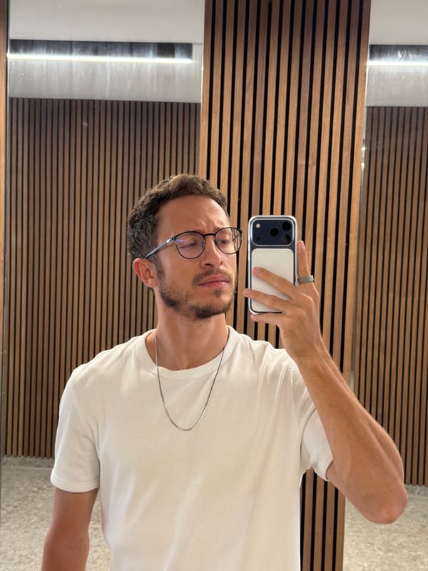 Man takes selfie at mirrored wall in Larnaca