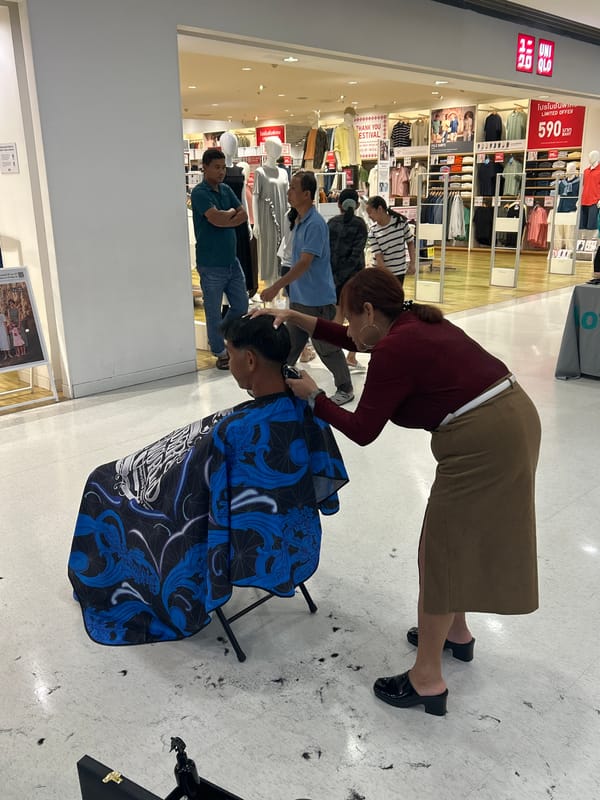 Pop-up barbershop and shopping activities documented in Ratsada, Thailand
