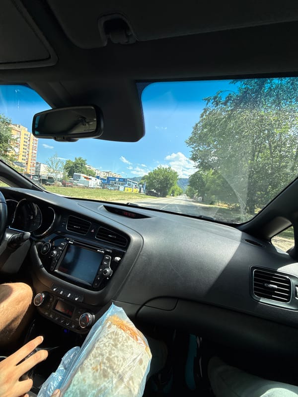 Driving through Vratsa with a bag of food on the seat