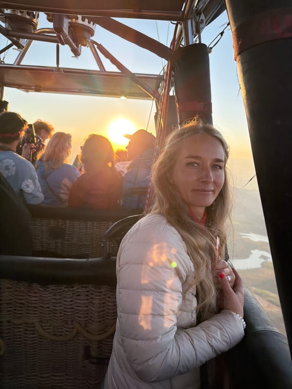 Woman enjoys sunrise hot air balloon ride in Turkey