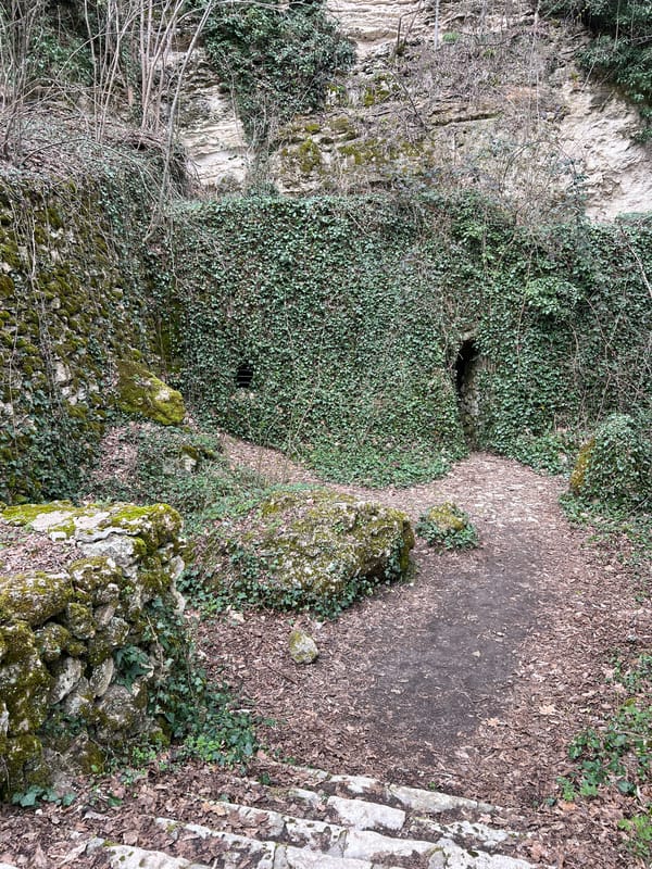 Tourist explores medieval Aladzha Monastery caves near Varna