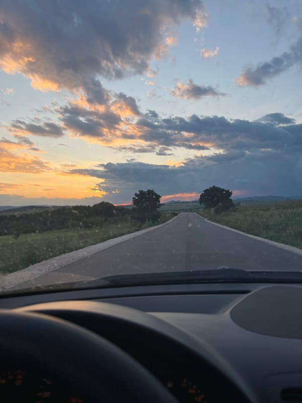 Driver captures rural road scene near Smilets, Bulgaria