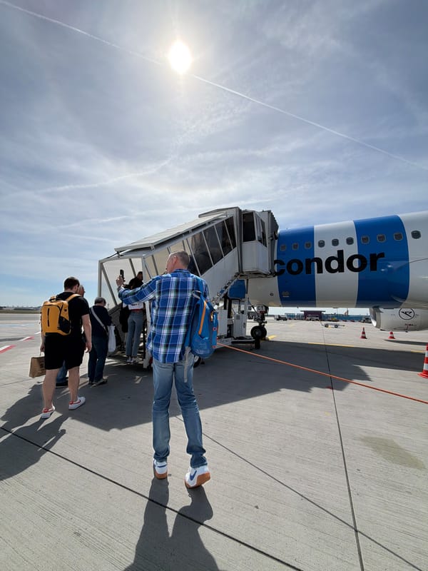 Condor Airlines passengers board, disembark at Frankfurt Airport