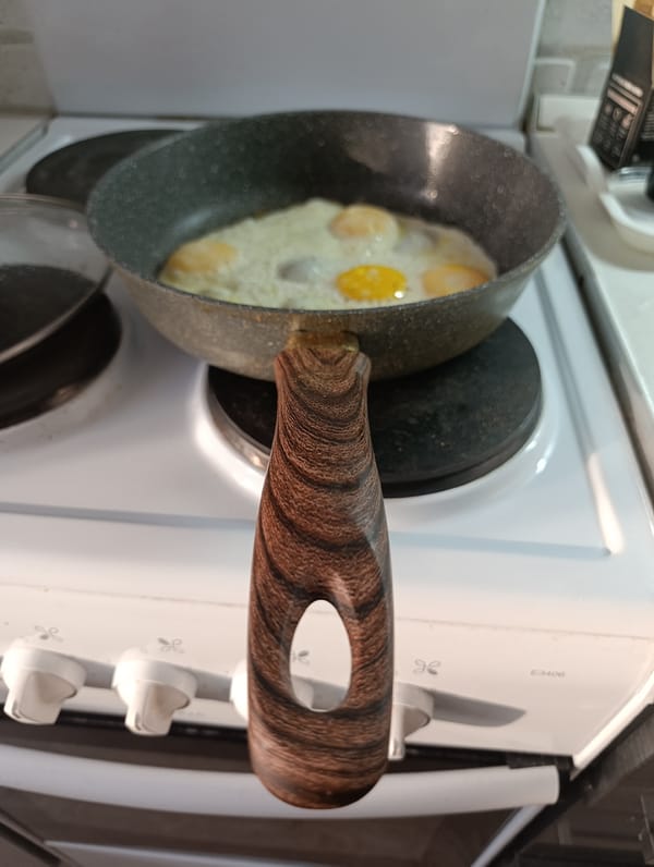 Early morning breakfast preparation documented in Saratov kitchen