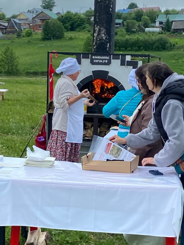 Outdoor cooking festival with wood ovens held in Foki, Russia