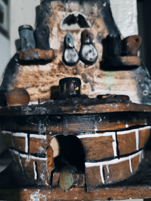 Miniature ceramic oven and rum promotional sphere spotted in Tinaquillo